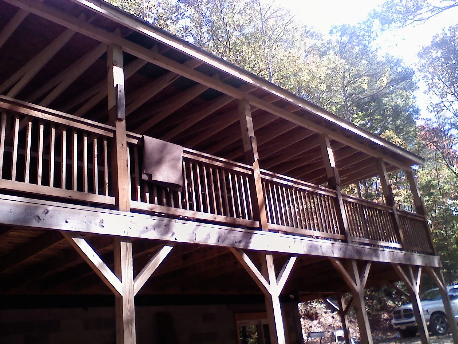 Timber framing under a new elevated porch and deck — Roof Leak Repair in Medfield by Roofing Brothers